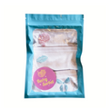 Displays our 3 pack Pastel Sugar Multipack folded in a blue and clear packaging pouch. The set contains our Low Brief in Lips in Sugar, the High Thong in Rose in Sugar and the High Thong in Bow in Sugar.